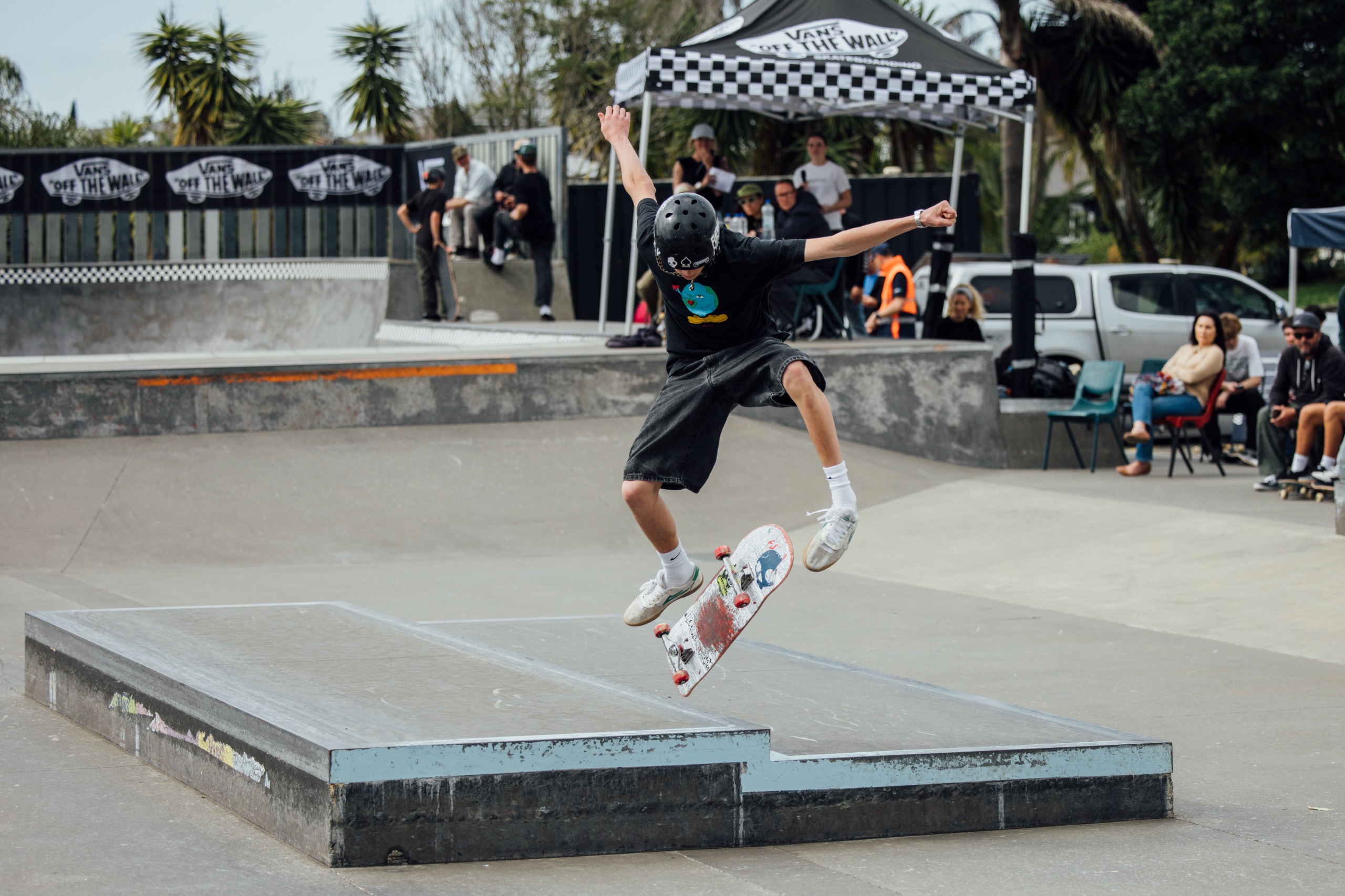 A skateboarder doing a trick.